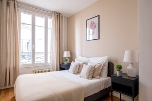 2 slaapkamers, een strijkplank/strijkijzer, gratis wifi, beddengoed