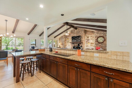 Beautiful Pool home on 2.5 acres with a serene country feel with urban location