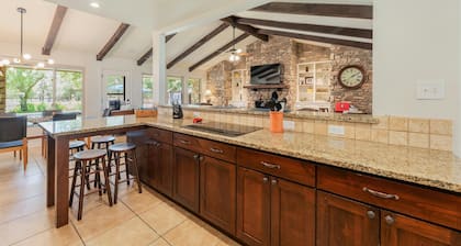 Beautiful Pool home on 2.5 acres with a serene country feel with urban location