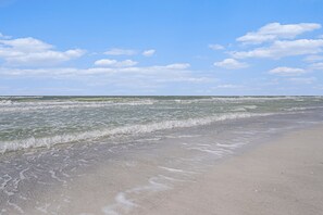 On the beach, sun-loungers, beach towels