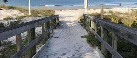 On the beach, sun-loungers, beach towels