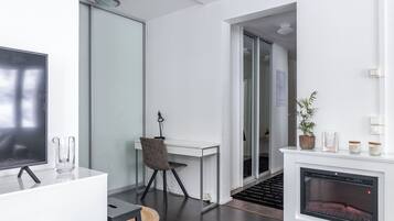 Apartamento Deluxe, vistas al patio | 1 dormitorio, ropa de cama de alta calidad, cortinas opacas