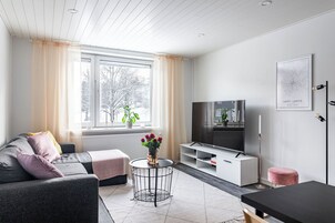 Comfort Apartment | Living area | Flat-screen TV