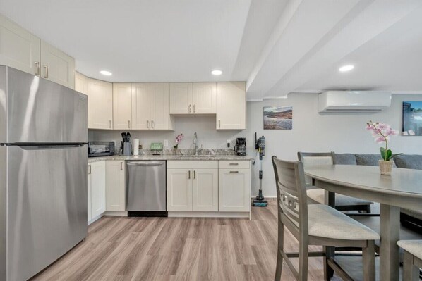 Fridge, microwave, dishwasher, coffee/tea maker