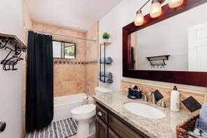 Hair dryer, towels, soap, shampoo