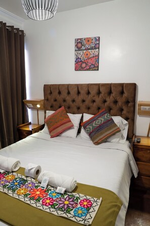 Habitación clásica | Edredones de plumas y wifi gratis