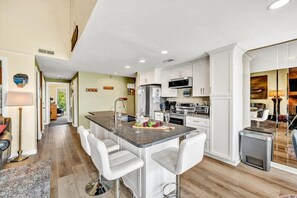 Fridge, microwave, oven, stovetop - Live, Love, Lake- Condo at Bernard`s Landing with community pool, beach and tennis courts. (Moneta)