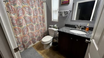 Shower, towels, soap, shampoo