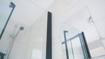 Shower, towels, toilet paper