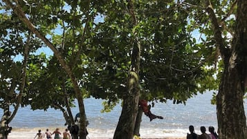 On the beach, sun-loungers, beach towels
