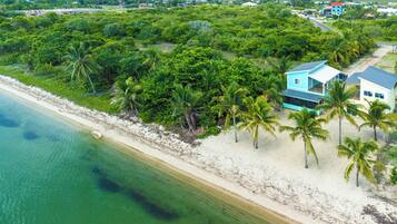 On the beach, sun-loungers, beach towels