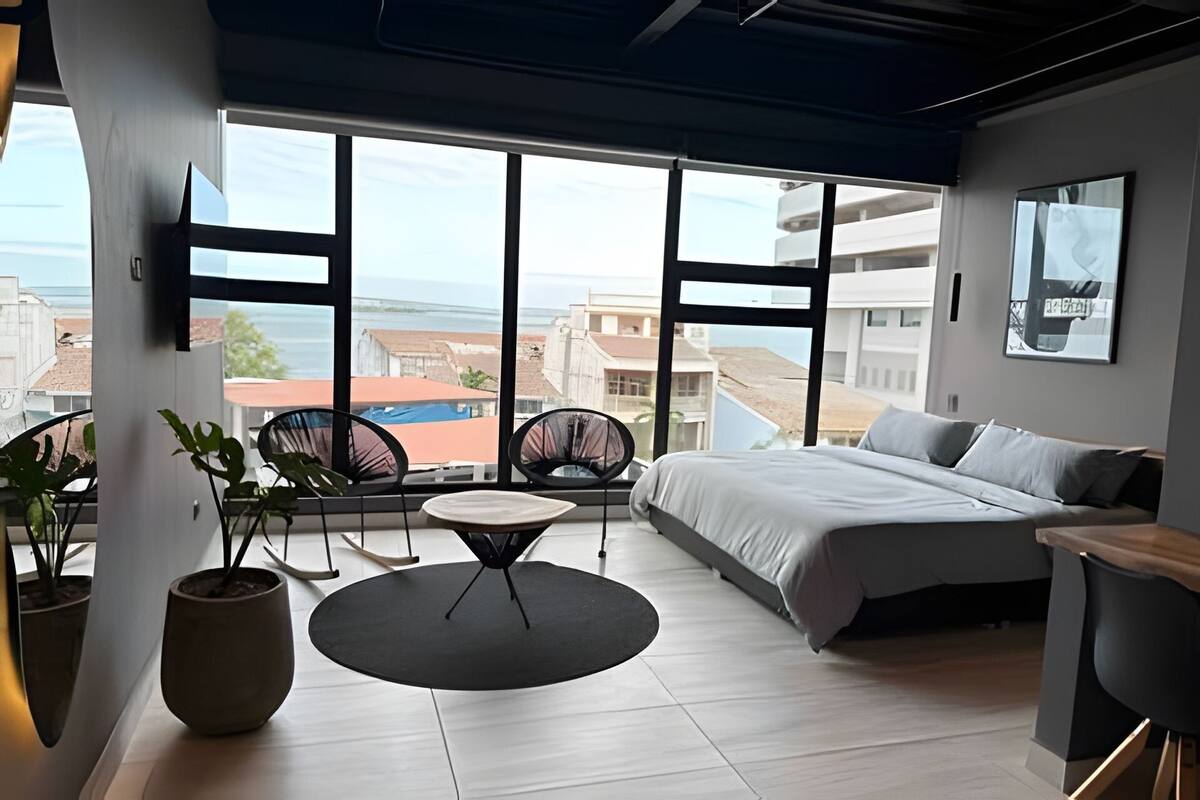 Apartament | 1 dormitori, cortines opaques i planxa i posts de planxar