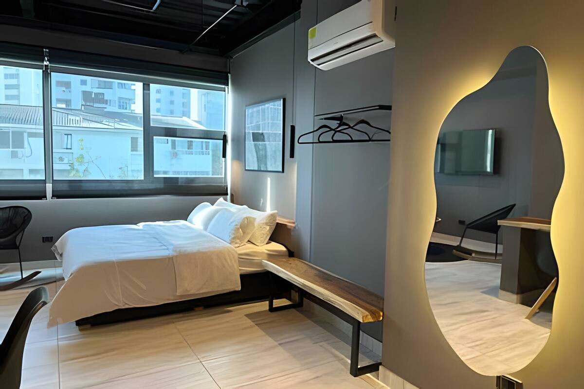 Apartament | 1 dormitori, cortines opaques i planxa i posts de planxar
