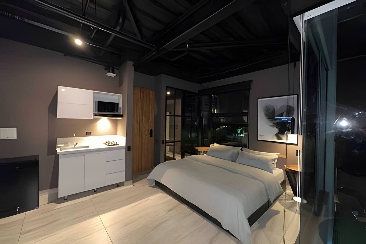 Apartament | 1 dormitori, cortines opaques i planxa i posts de planxar