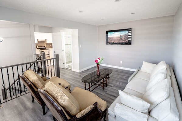 Living area - Very central Full renovated in Aug 2024 rare find pet friendly 2 min from hwy1 (Calgary)