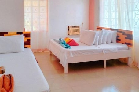 Room. RedDoorz @ Jmalls Island Tourist Inn Dinagat Island
