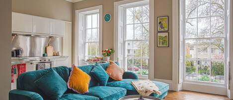 Apartment, City View | Living area | Flat-screen TV
