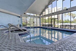 Indoor pool, 2 outdoor pools, open 8:00 AM to 8:00 PM, pool umbrellas