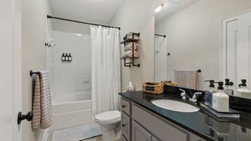 Hair dryer, towels, soap, shampoo