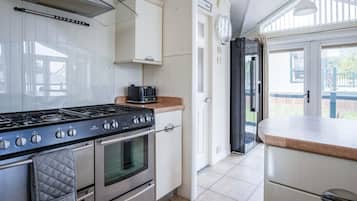 Microwave, oven, toaster, dining tables