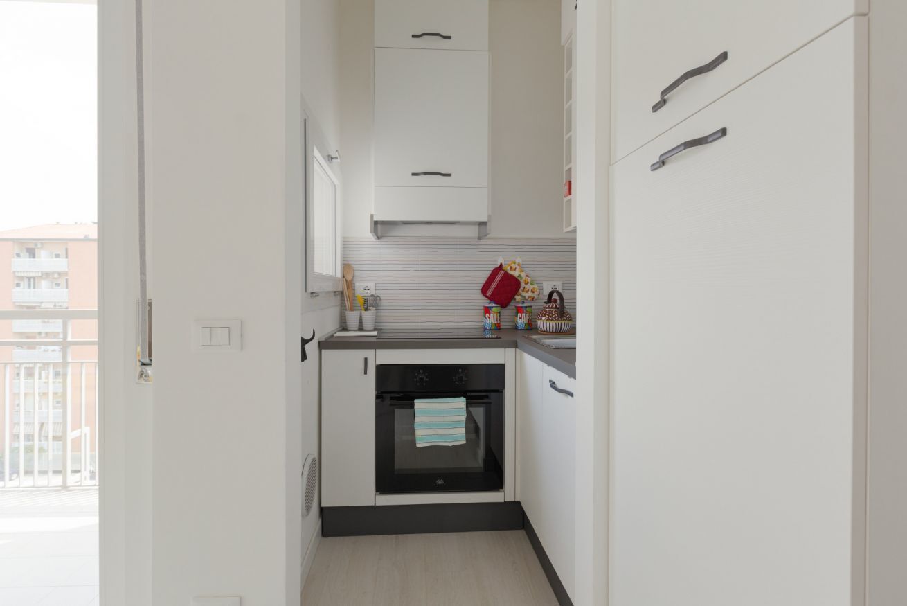 Frigorifero, forno, piano cottura, tostapane