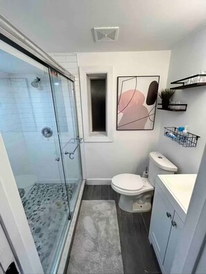 Shower, hair dryer, towels, soap