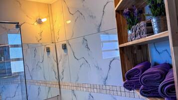 Shower, towels, toilet paper