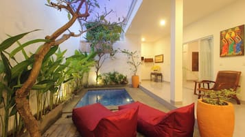 Villa, 2 Bedrooms | Living area | 40-inch flat-screen TV with cable channels