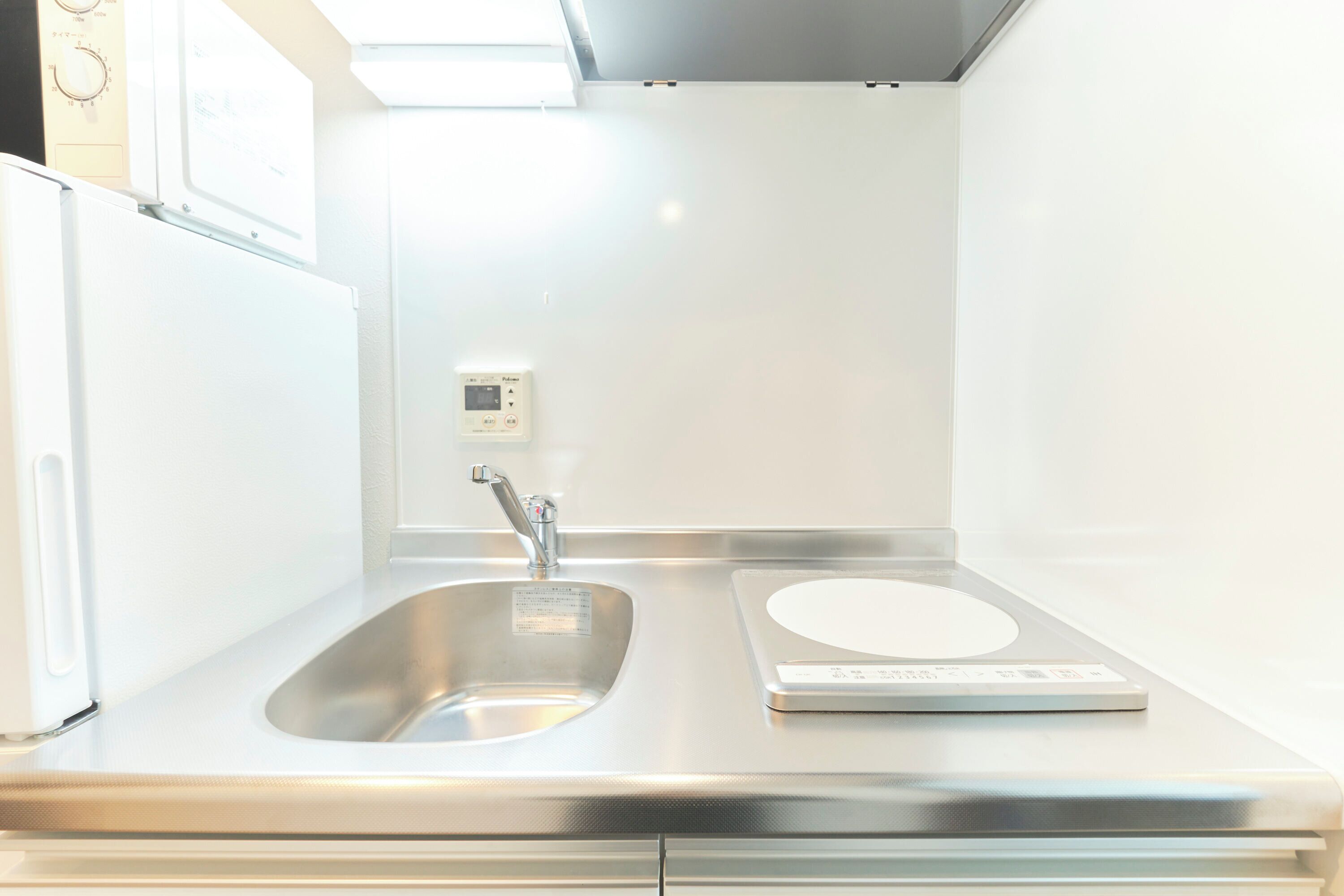 Mini-fridge, microwave, stovetop, electric kettle