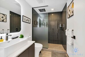 Shower, hair dryer, towels