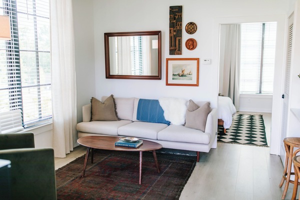 Step into the inviting living room, perfect for winding down after a day of adventure. Sink into the comfy sofa and kick back, whether you're binging your favorite series on the large-screen TV or enjoying a peaceful night in. This space is all about comfort and entertainment—make yourself at home!