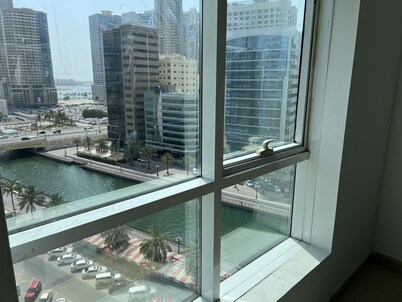 Cozy 1-bedroom apartment in  Sharjah with AC, WiFi