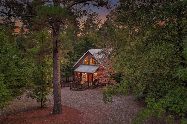 Enjoy a serene stay in our cabin where you will be surrounded by whispering pines and the beauty of nature.