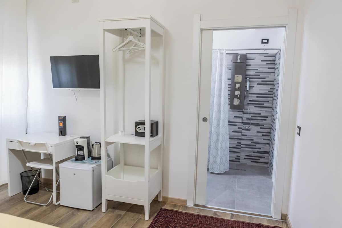 Deluxe kamer, 1 twee- of 2 eenpersoonsbedden | Een kluis op de kamer, verduisterende gordijnen, geluiddichte muren