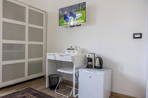 Habitación Deluxe con 1 cama matrimonial o 2 individuales | Caja de seguridad en la habitación, cortinas blackout y insonorización 