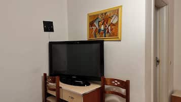 1 habitación, tabla de planchar con plancha y wifi gratis