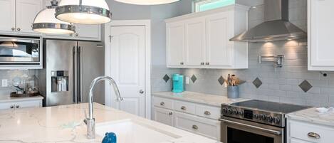 Fridge, microwave, dishwasher, coffee/tea maker