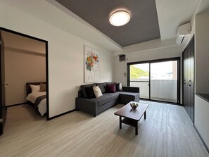 Departamento Deluxe | Área de sala de estar