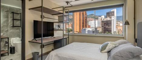 1 غرفة نوم ومكتب وواي فاي وملاءات أسرّة