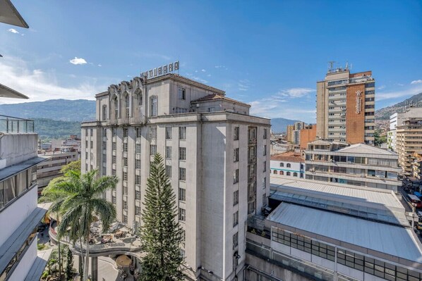 Stunning urban landmark with a grand, ornate facade and vertical windows.