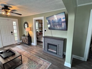 TV connectée, cheminée, jeux vidéo