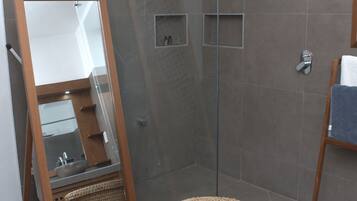 Shower, hair dryer, towels, soap
