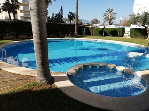 Pool - Nice ground floor apartment, three bedrooms on the first line, WIFI, large terrace and garden for private use! (Xeraco Playa)