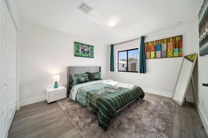4 bedrooms, desk, iron/ironing board, travel cot