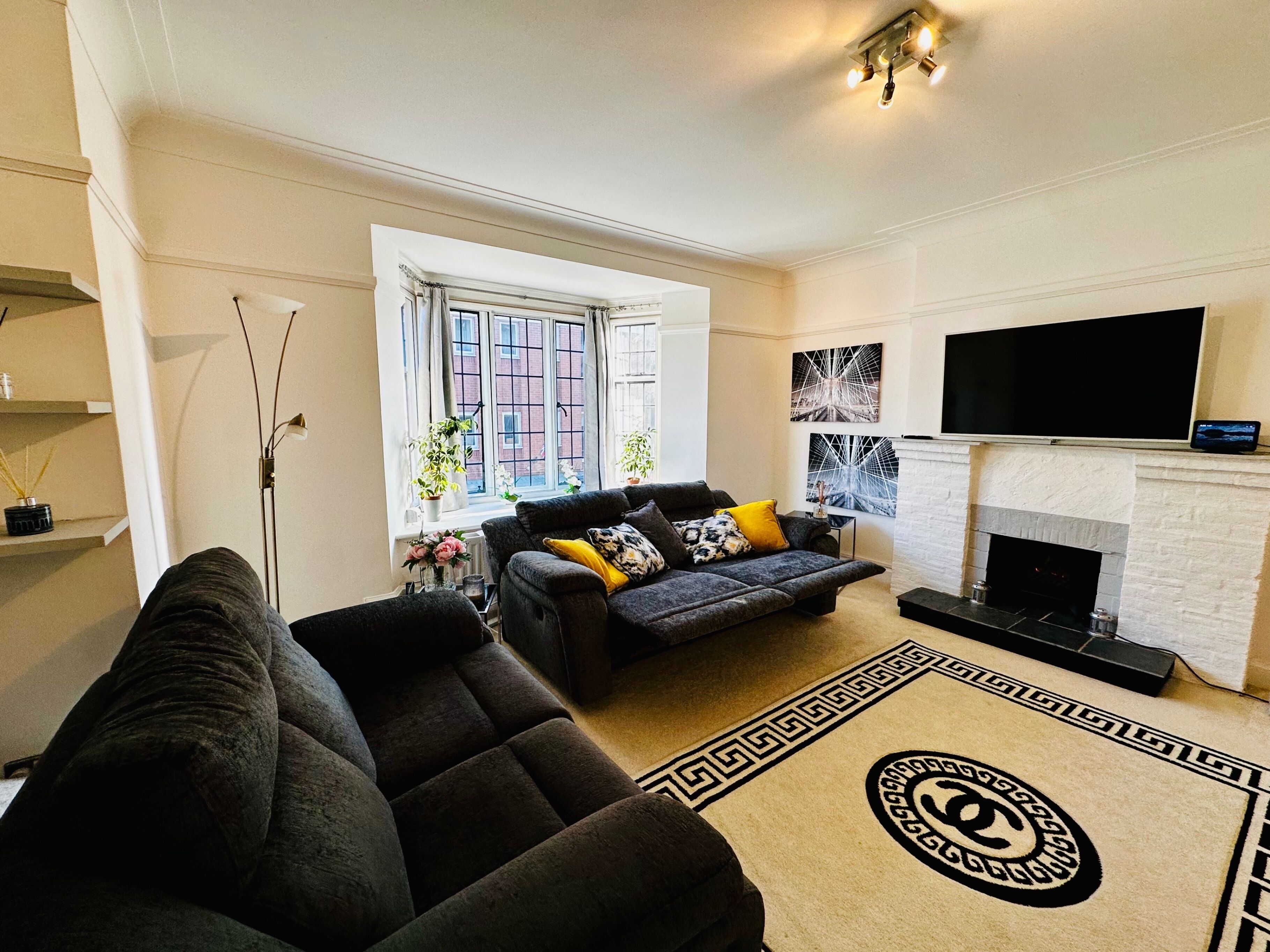 Apartment | Living area | TV, fireplace