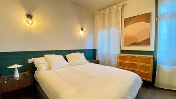 1 slaapkamer, een strijkplank/strijkijzer, wifi, beddengoed