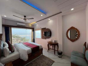 Premium Suite, Balcony, River View | Memory foam beds, desk, free WiFi, bed sheets - Hotel Royal Shantii Inn (Varanasi)