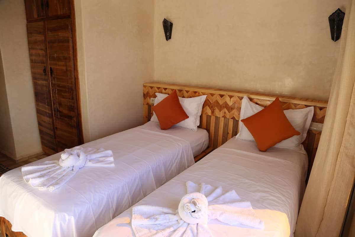 Deluxe Room, Pool View | Premium bedding, in-room safe, free cribs/infant beds, free WiFi