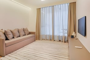 Apartment | Living area | Flat-screen TV - HomyCO - Conforto na esqui praia (Niteroi)