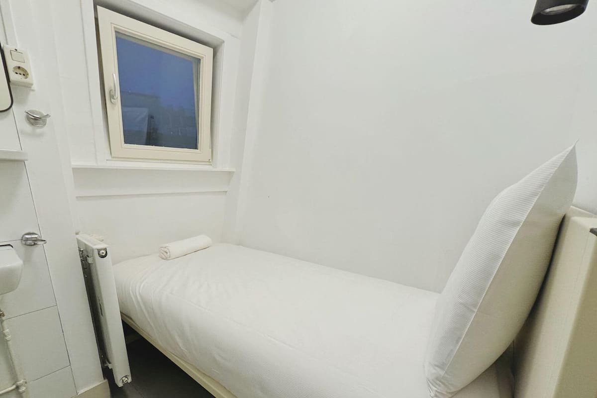 Economy Single Room, Shared Bathroom | Iron/ironing board, free WiFi, bed sheets
